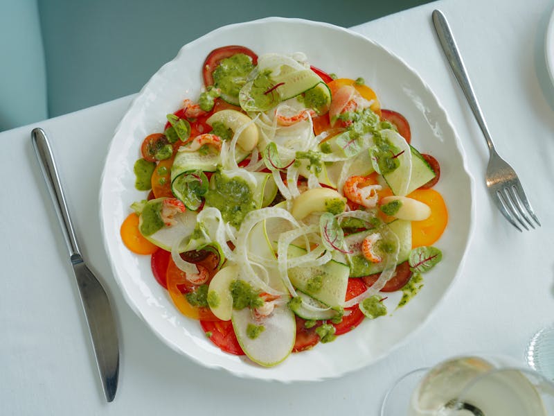 Fresh green salad with lemon dressing
