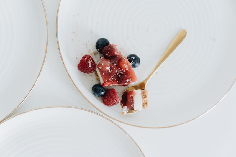Cheesecake slice with berry compote