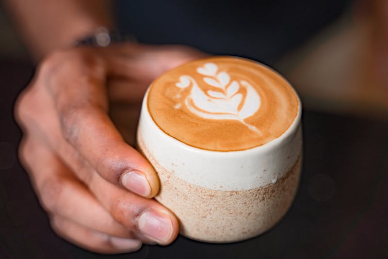 Tatte specialty latte with latte art